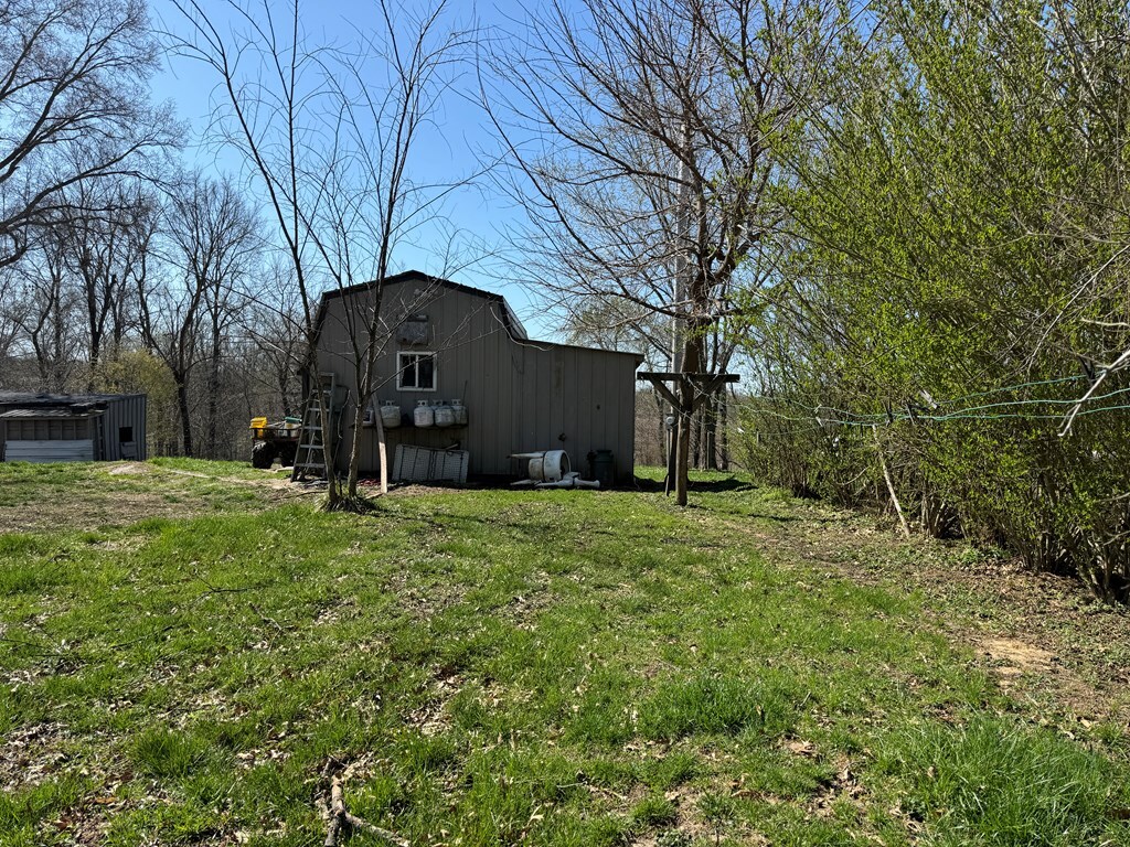19201 Hopalong Trl, Novinger, MO 63559 - view of yard featuring an outbuilding