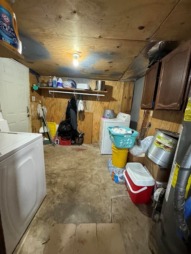 storage area featuring washer and dryer