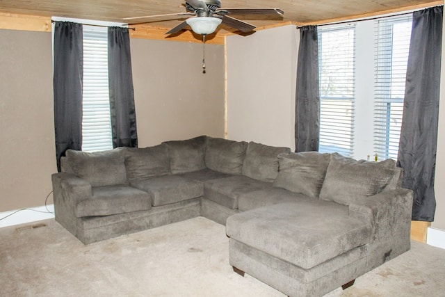 living area with ceiling fan