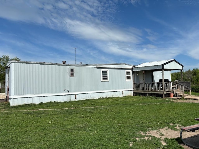 21161 State Highway Ff, Worthington, MO 63567 - back of property featuring a yard and a deck