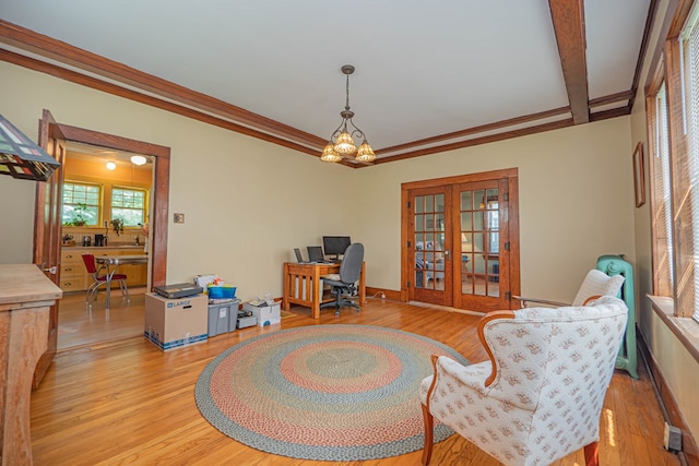 409 E Elm St, Huntsville, MO 65259 - office featuring french doors, light wood-style flooring, and a chandelier