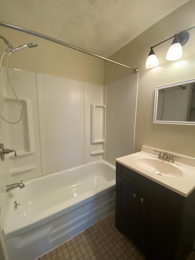 701 E Cottonwood, Kirksville, MO 63501 - bathroom featuring tile patterned floors, shower / washtub combination, and vanity