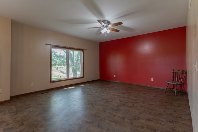 25340 SW Blvd, Bevier, MO 63532 - spare room featuring a ceiling fan and baseboards