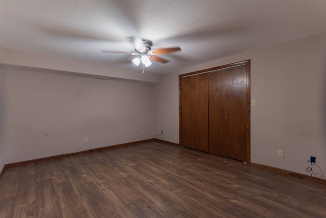 25340 SW Blvd, Bevier, MO 63532 - unfurnished bedroom featuring wood finished floors, a closet, and ceiling fan