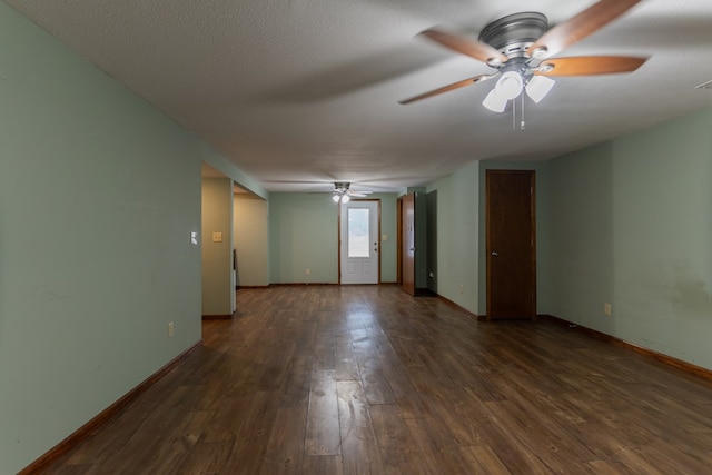 25340 SW Blvd, Bevier, MO 63532 - unfurnished room featuring a ceiling fan and dark wood finished floors
