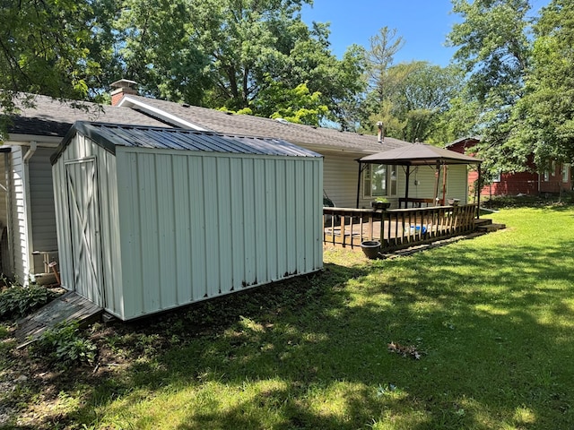 202 W Laharpe St, Kirksville, MO 63501 - view of home's exterior with a gazebo, a storage shed, a yard, and a wooden deck