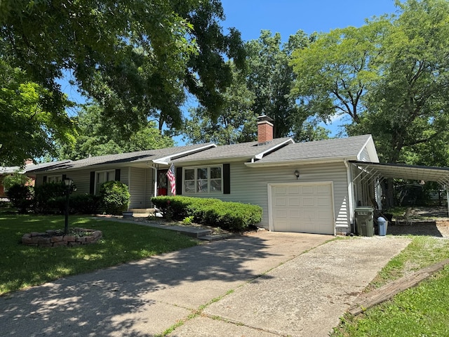 202 W Laharpe St, Kirksville, MO 63501 - view of front of house with a garage, a chimney, a front lawn, driveway, and a carport