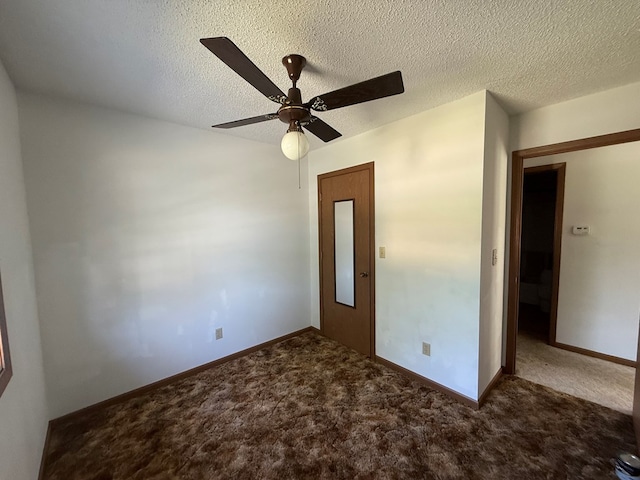 1214 E Washington, Kirksville, MO 63501 - unfurnished room with carpet flooring, a ceiling fan, and a textured ceiling