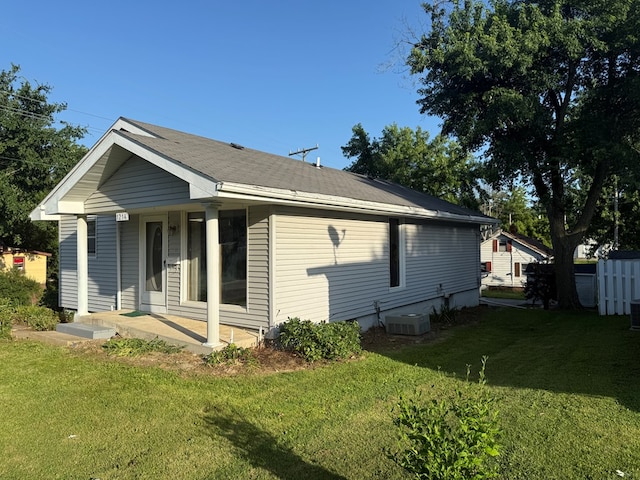 1214 E Washington, Kirksville, MO 63501 - view of property exterior with covered porch and a yard