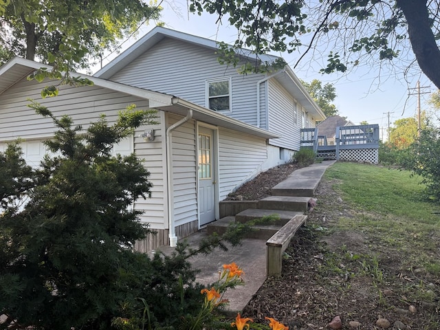 1214 E Washington, Kirksville, MO 63501 - view of home's exterior with a wooden deck