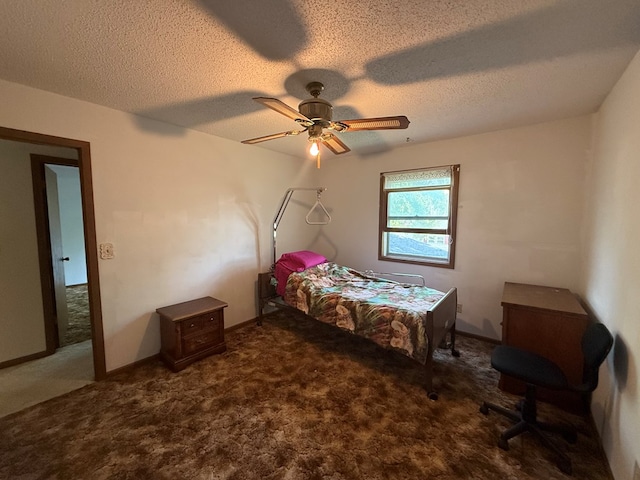1214 E Washington, Kirksville, MO 63501 - bedroom with carpet, ceiling fan, and a textured ceiling
