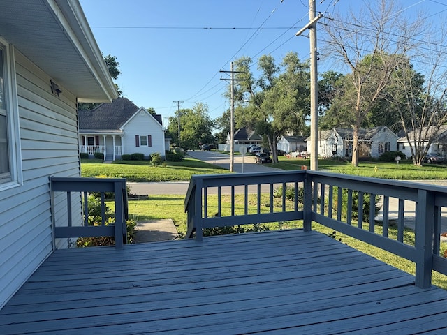 1214 E Washington, Kirksville, MO 63501 - wooden deck featuring a residential view and a yard