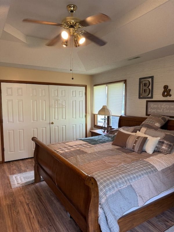 34829 State Highway C, Bevier, MO 63532 - bedroom with wood finished floors, a closet, and a ceiling fan
