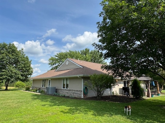 34829 State Highway C, Bevier, MO 63532 - view of side of home featuring a yard and brick siding