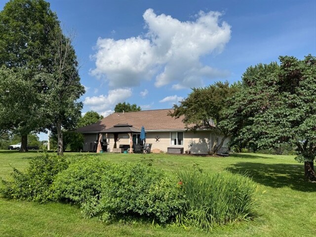 34829 State Highway C, Bevier, MO 63532 - back of property with a gazebo and a lawn