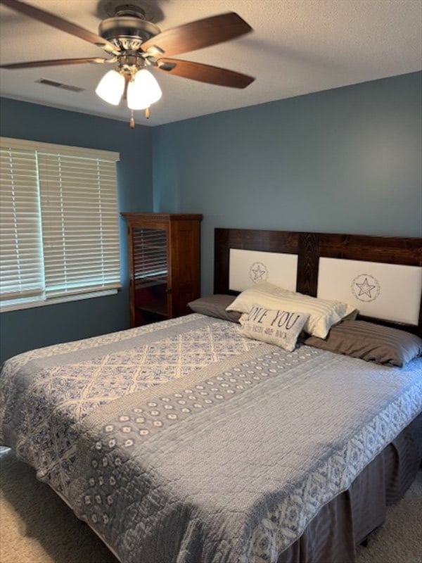 34829 State Highway C, Bevier, MO 63532 - bedroom featuring carpet and a ceiling fan