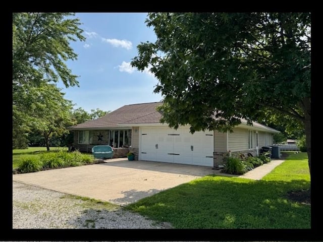 34829 State Highway C, Bevier, MO 63532 - ranch-style house featuring concrete driveway, a garage, a front yard, and brick siding