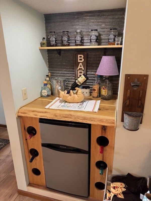 34829 State Highway C, Bevier, MO 63532 - indoor dry bar featuring fridge