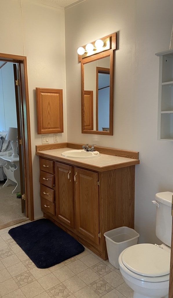 half bath with toilet and vanity