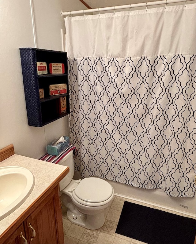full bath featuring toilet and vanity