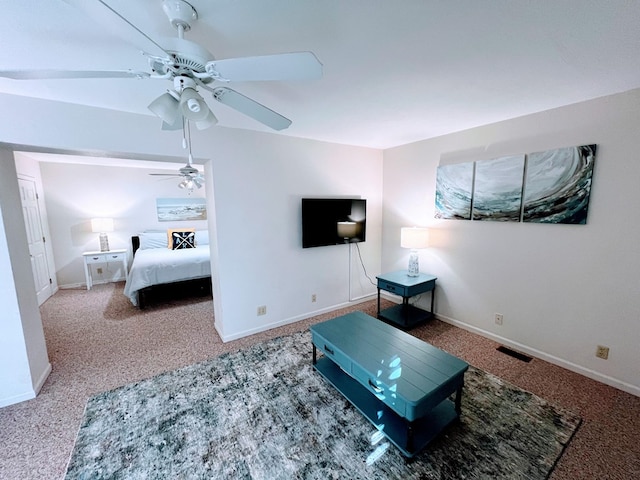 interior space with ceiling fan