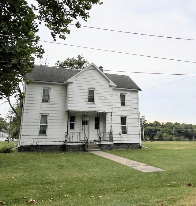 view of front of house with a front lawn