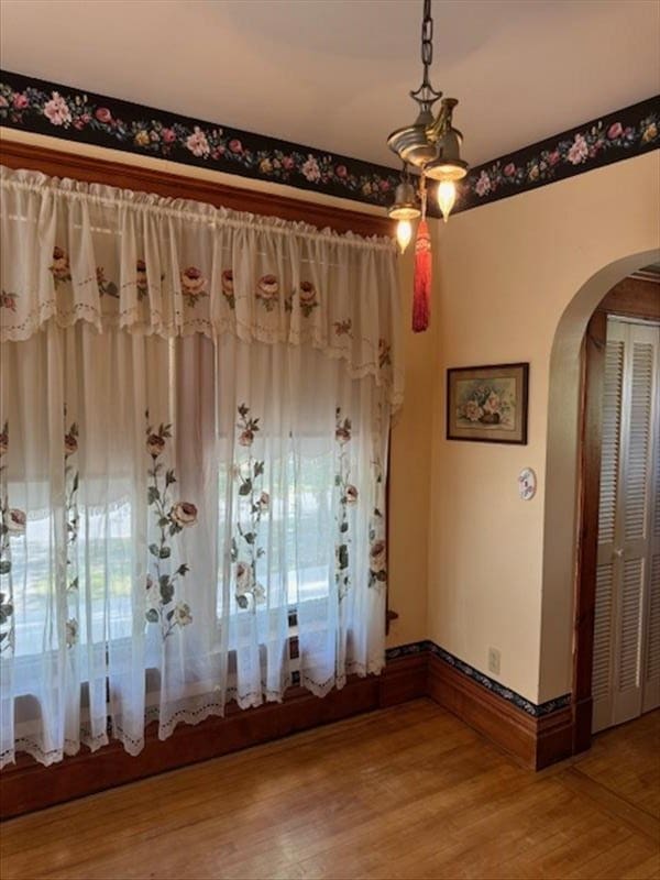 empty room featuring hardwood / wood-style floors