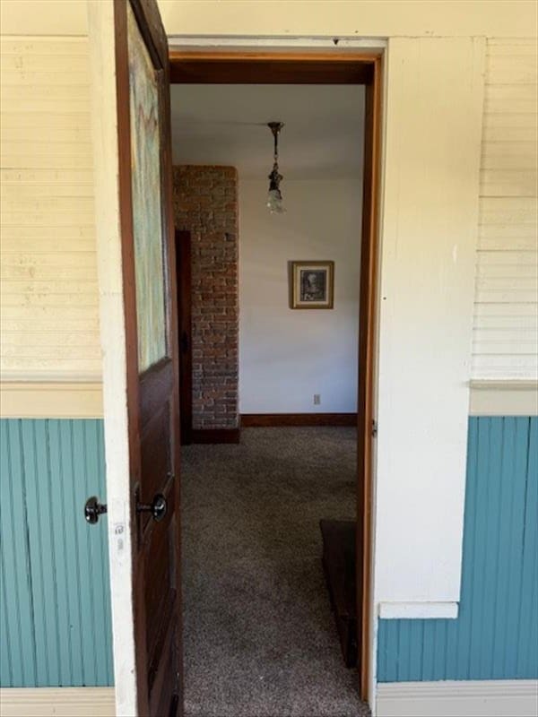 hallway featuring carpet floors