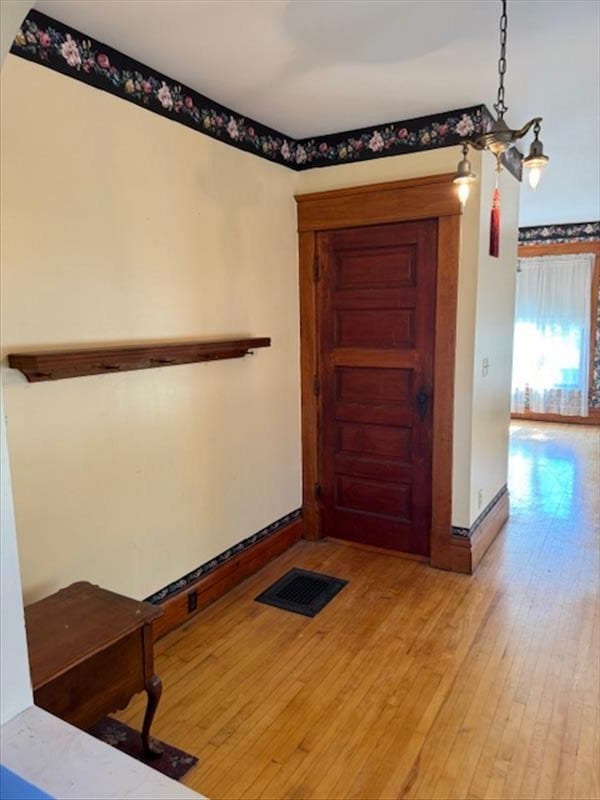 foyer entrance featuring light wood-type flooring