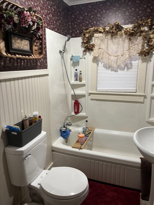 201 N Wentz, Macon, MO 63552 - full bath featuring wallpapered walls, washtub / shower combination, and a wainscoted wall