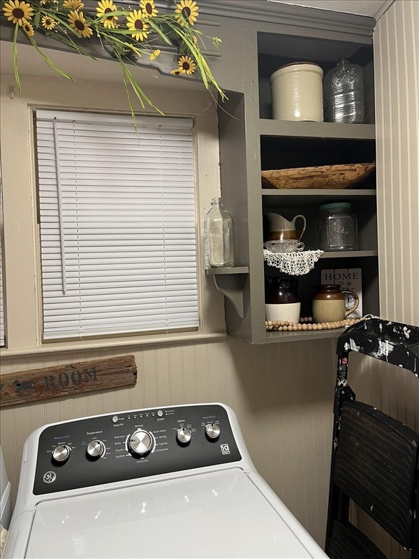 201 N Wentz, Macon, MO 63552 - washroom featuring washer / clothes dryer, a wainscoted wall, and wooden walls