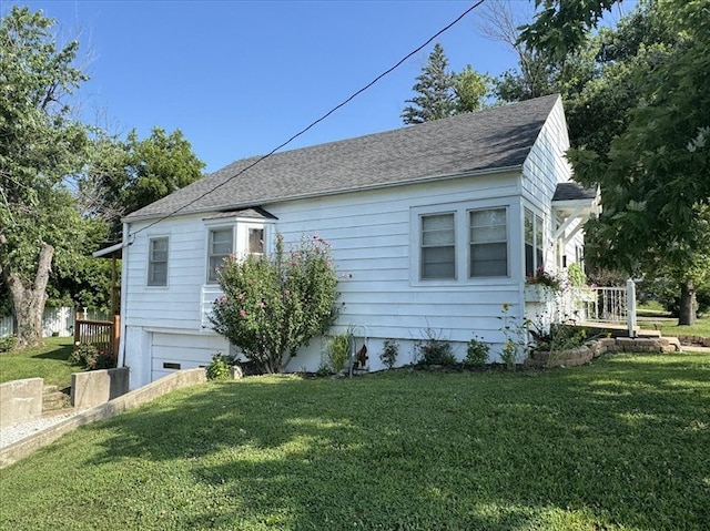 201 N Wentz, Macon, MO 63552 - view of side of property with a yard and a shingled roof