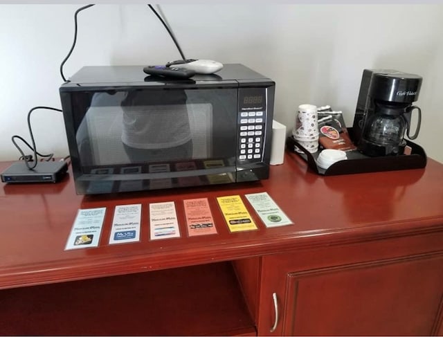 101 S Main St, Usa, Marceline, MO 64658 - detailed view of black microwave