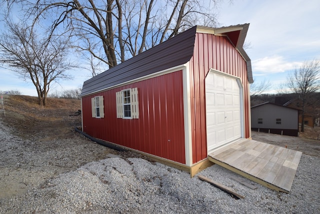 view of outdoor structure with a garage