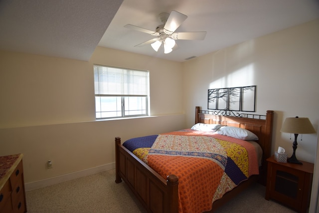 bedroom featuring ceiling fan and carpet floors