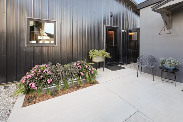 doorway to property featuring a patio