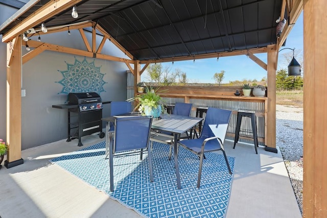 view of patio / terrace featuring a gazebo and area for grilling