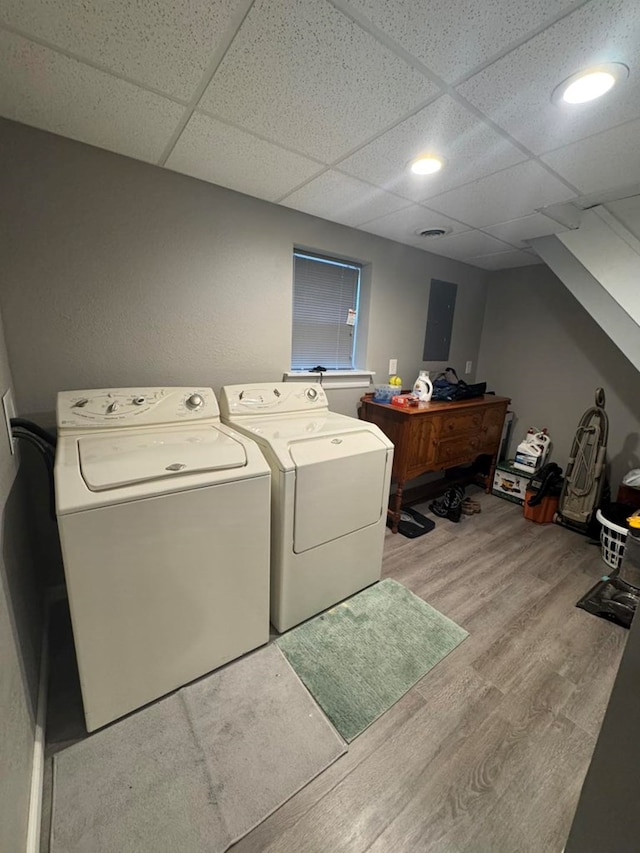 113 Elm St, Milan, MO 63556 - laundry area featuring light wood-style floors, separate washer and dryer, and recessed lighting