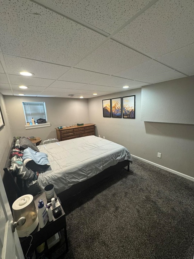 113 Elm St, Milan, MO 63556 - carpeted bedroom featuring a paneled ceiling and baseboards
