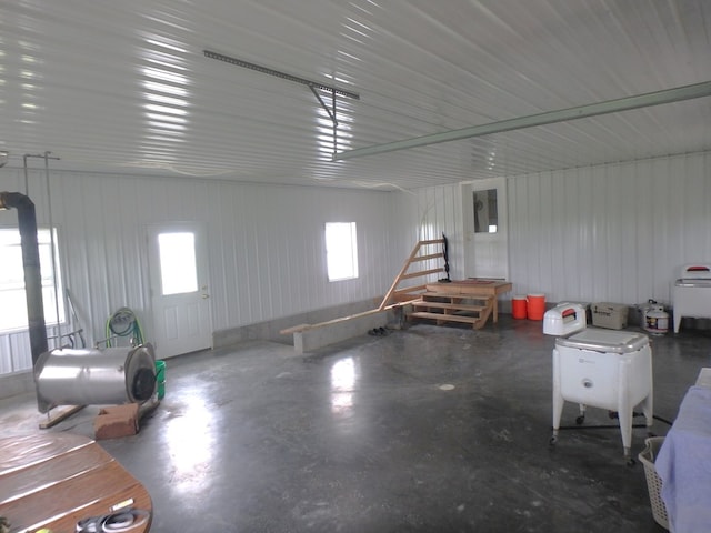 garage with wood walls