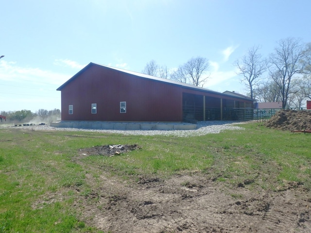 view of property exterior featuring an outdoor structure