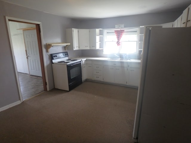 302 N King St, Brashear, MO 63533 - kitchen featuring range with electric cooktop, open shelves, light carpet, freestanding refrigerator, and white cabinetry