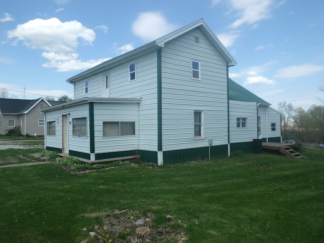 302 N King St, Brashear, MO 63533 - rear view of house featuring a lawn