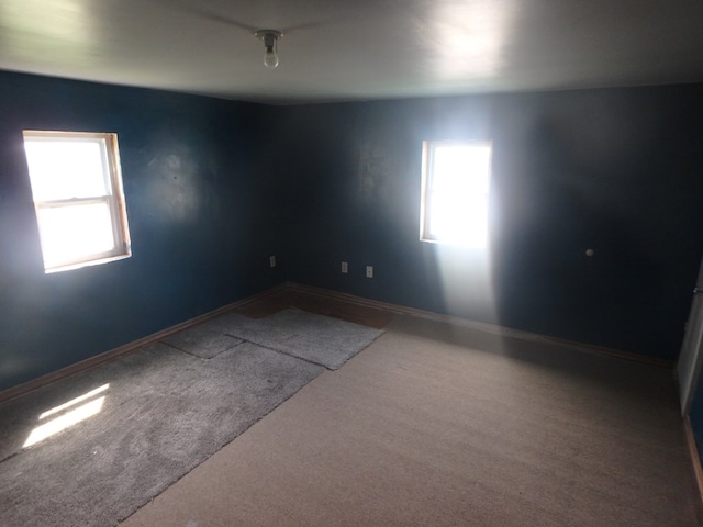 302 N King St, Brashear, MO 63533 - carpeted spare room featuring plenty of natural light and baseboards