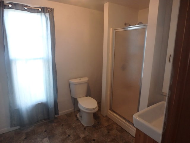 302 N King St, Brashear, MO 63533 - full bathroom with a shower stall, toilet, and baseboards