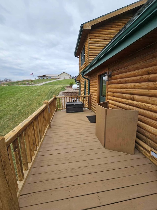 deck featuring a lawn