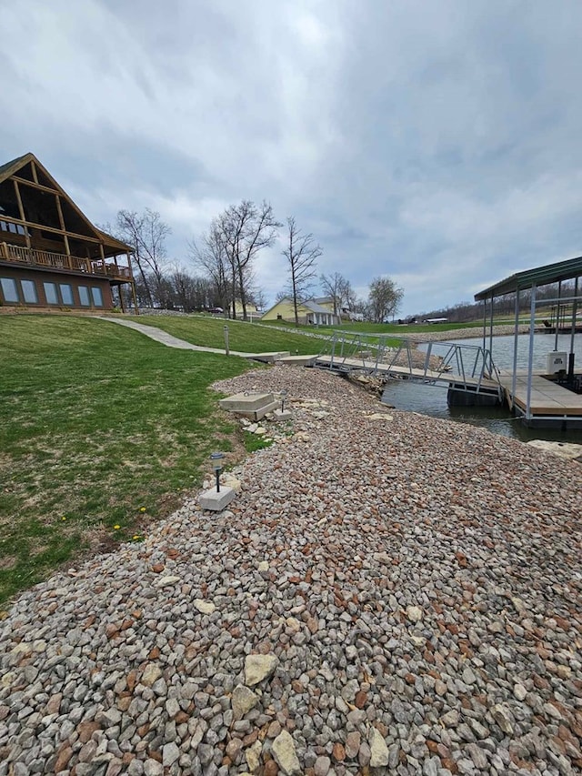 dock area with a yard