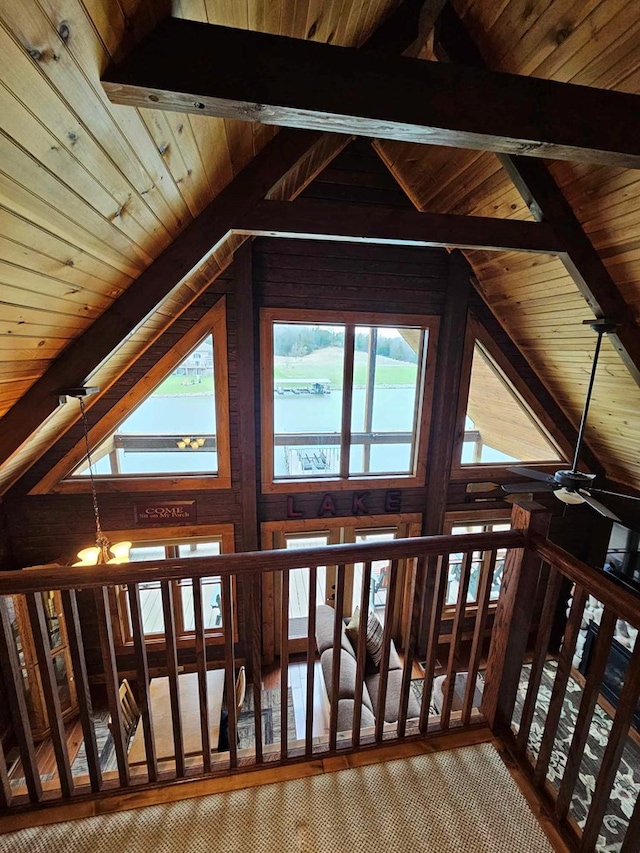 details featuring beamed ceiling, wooden ceiling, and ceiling fan