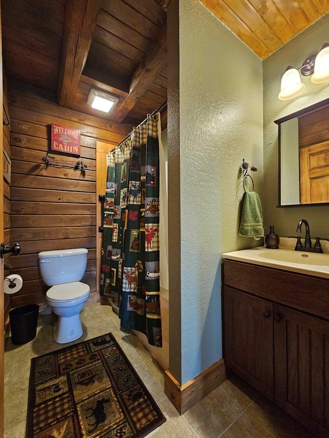 full bathroom featuring wood ceiling, a textured wall, wood walls, and toilet