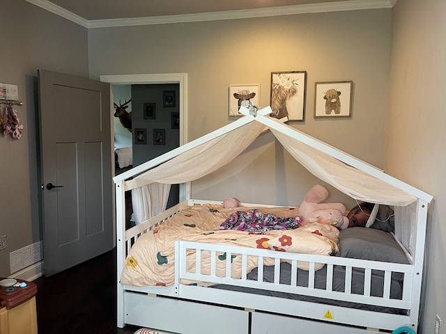 bedroom featuring crown molding